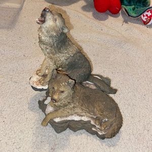 Howling at the moon wolf sculpture